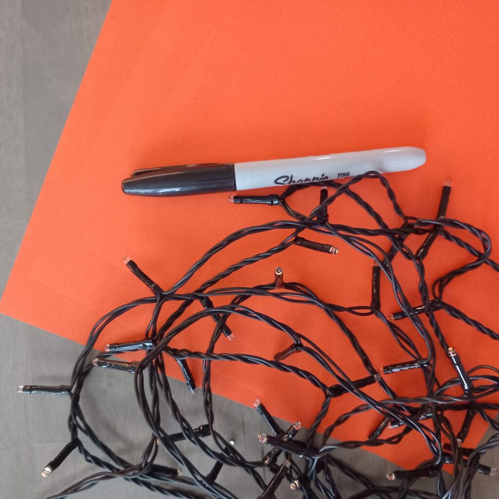 DIY origami lanterns materials Marker pen, fairy lights and papers for DIY origami string lights