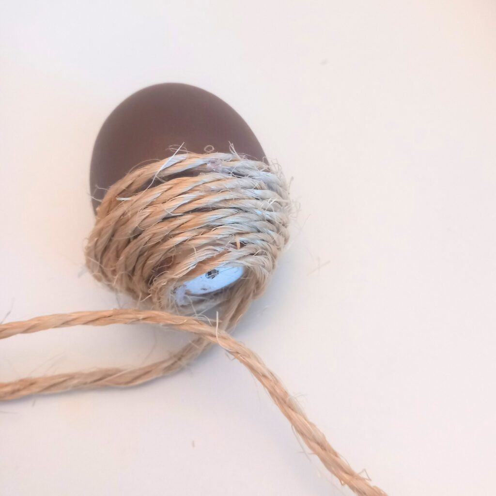 Coiling Twine for Acorn Cap Coiling twine from the spool to create acorn caps on eggshells for fall craft